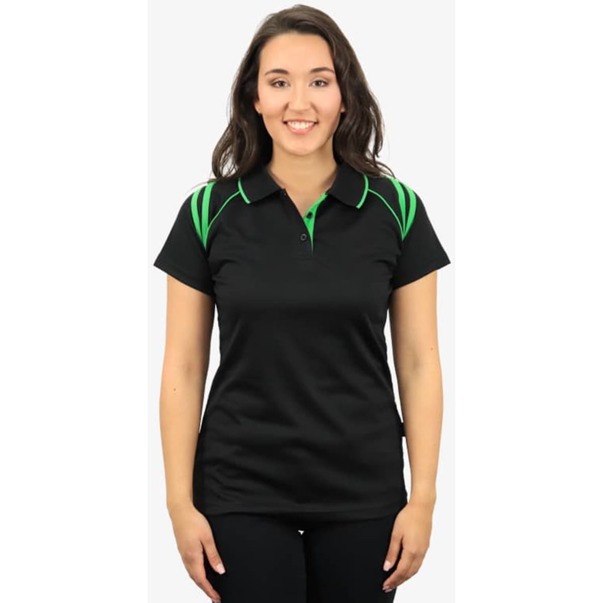 A black polo shirt with green accents and a logo on the chest, modelled by a smiling woman.