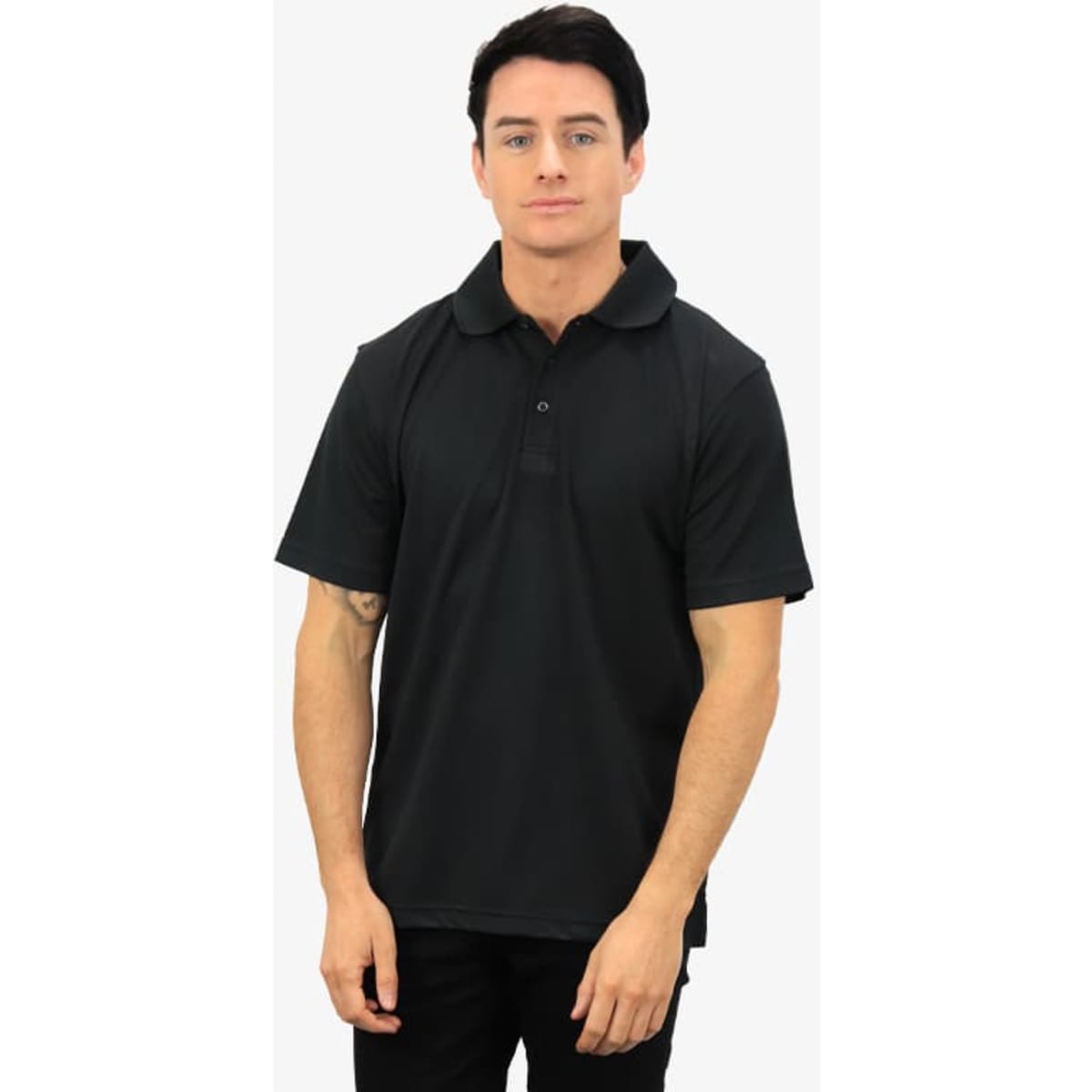 A black polo shirt displayed on a model, featuring a collar and short sleeves. The shirt has a logo on it.