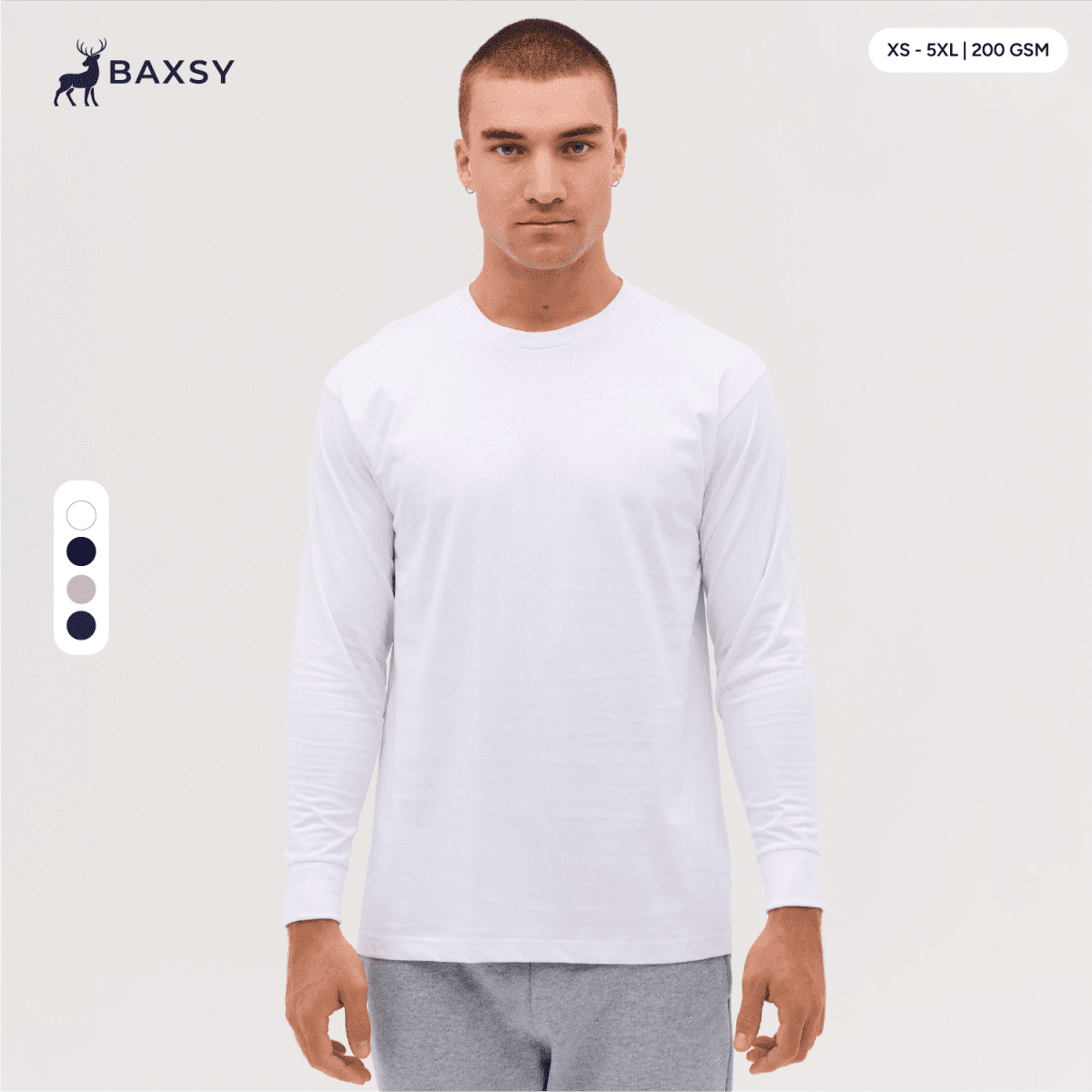 A long sleeve tee in white, featuring a relaxed fit and a logo on the upper left side.