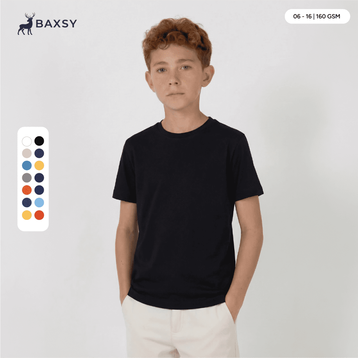 A youth black core tee displayed on a model, featuring a round neck and short sleeves, with a logo present.
