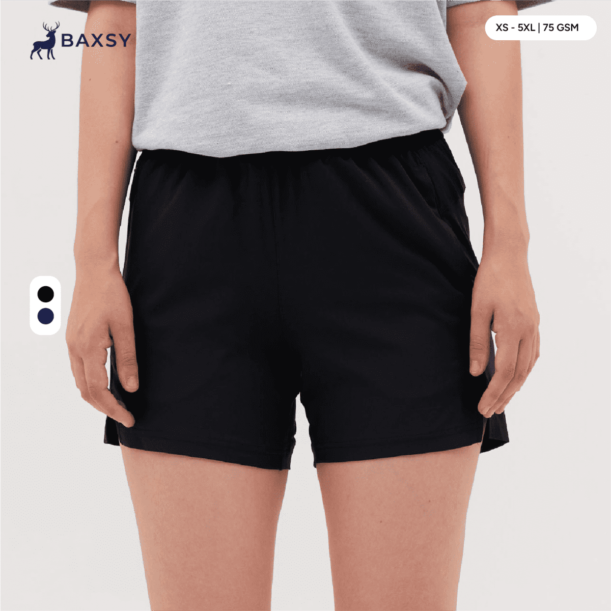 Black running shorts with an elastic waistband, featuring pockets and a logo on the waistband.