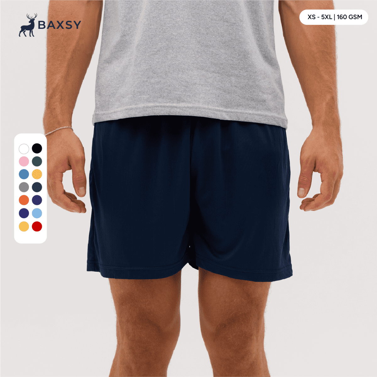 Navy shorts displayed on a model, featuring an elastic waistband and side pockets. Includes a colour selection chart.