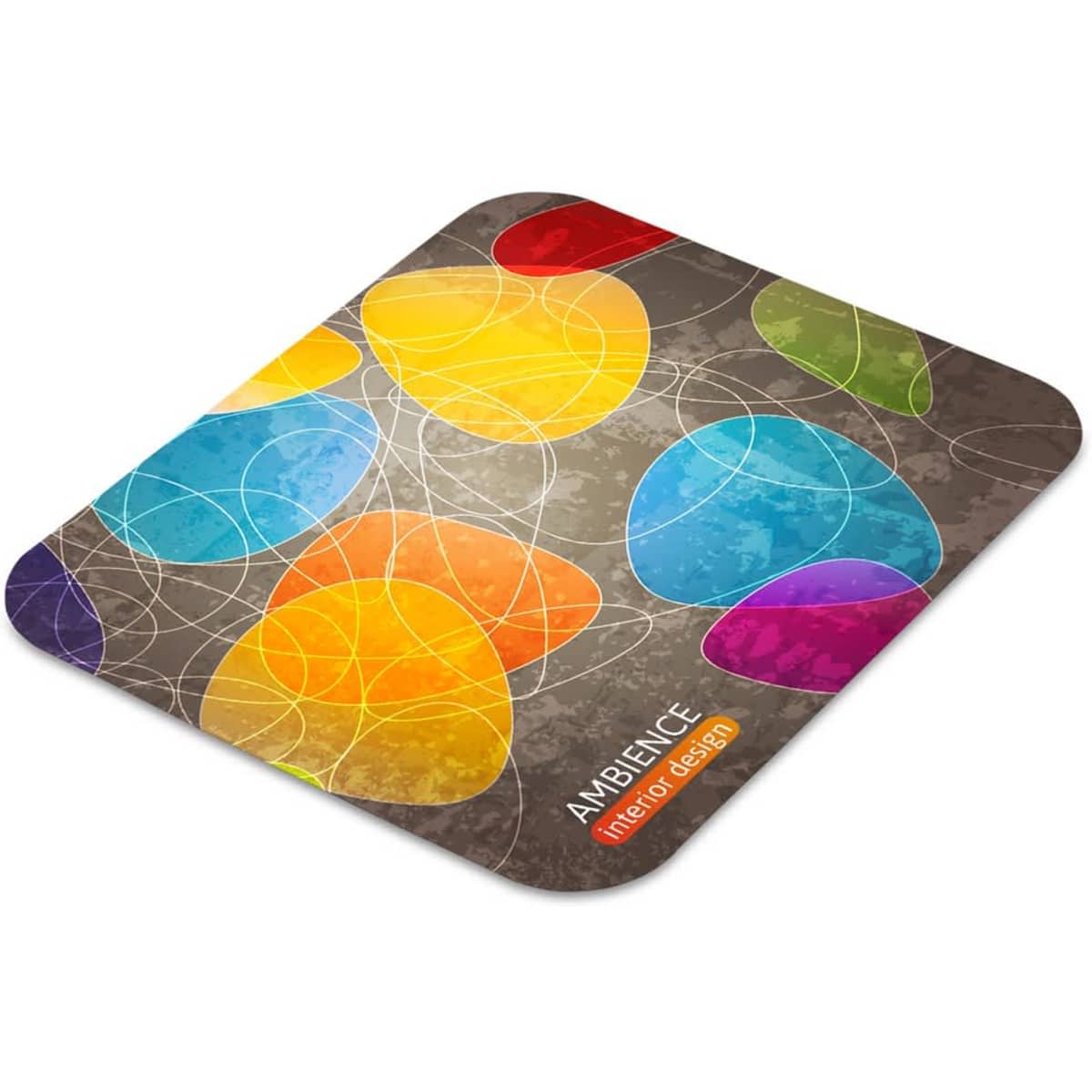 A colourful neoprene mouse mat featuring abstract shapes in blue, yellow, orange, and purple on a grey background.