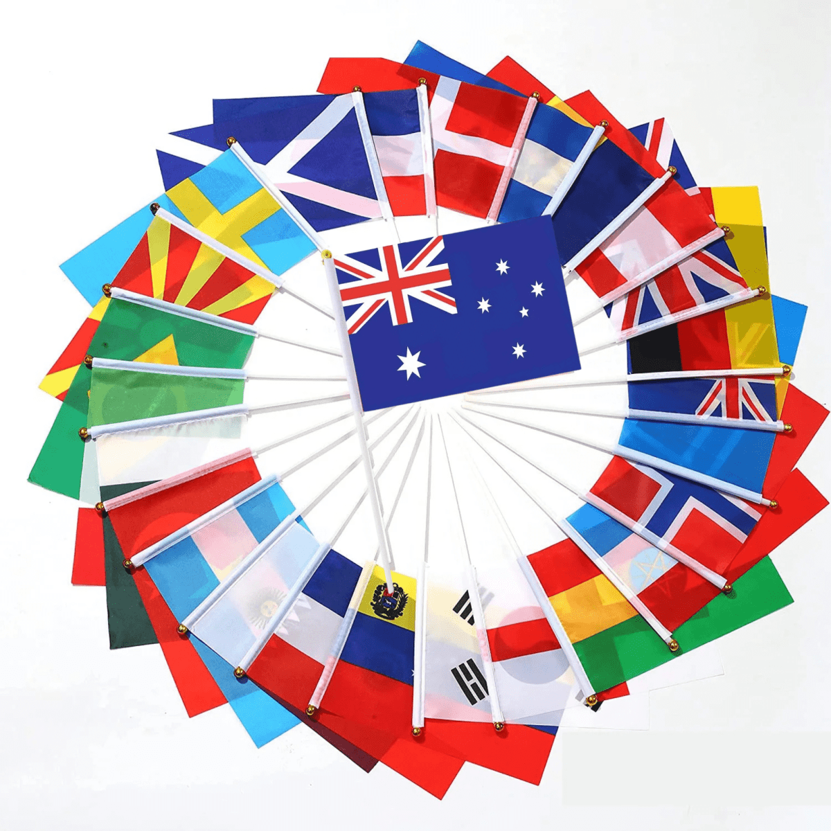 A collection of handheld flags, including the Australian flag, with various international flags on white poles.