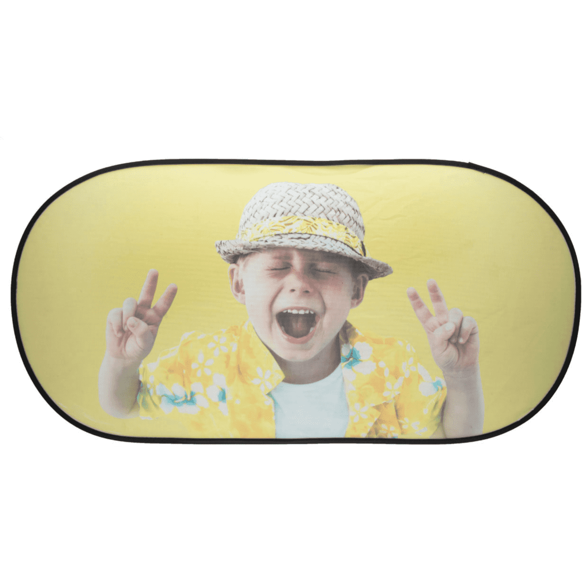 A folding car sunshade featuring a cheerful child in a yellow floral shirt and hat, with a playful peace sign gesture.