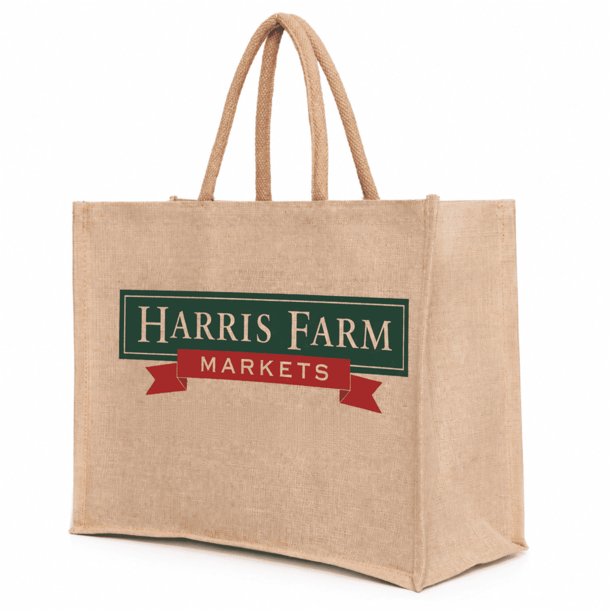 A large, natural-coloured juco bag with sturdy handles and a logo on one side.