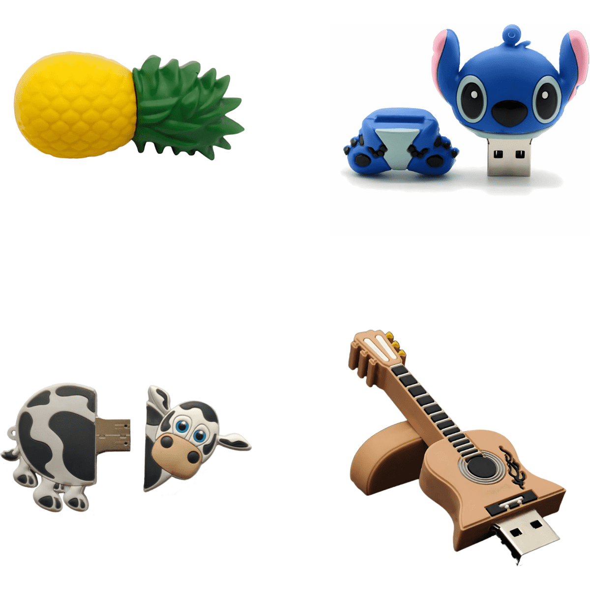 A collection of four custom 3D USB flash drives, including a pineapple, cow, guitar, and a blue character with ears.