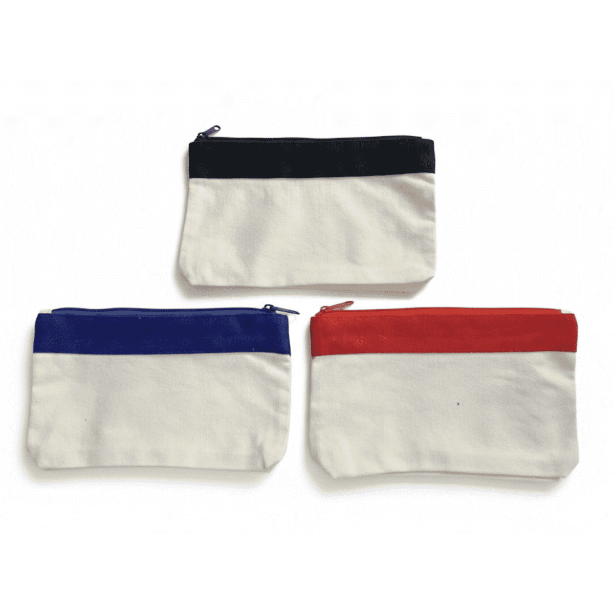 A trio of canvas pencil cases in navy, royal blue, and red, featuring a cream-coloured body. Each has a zip closure.