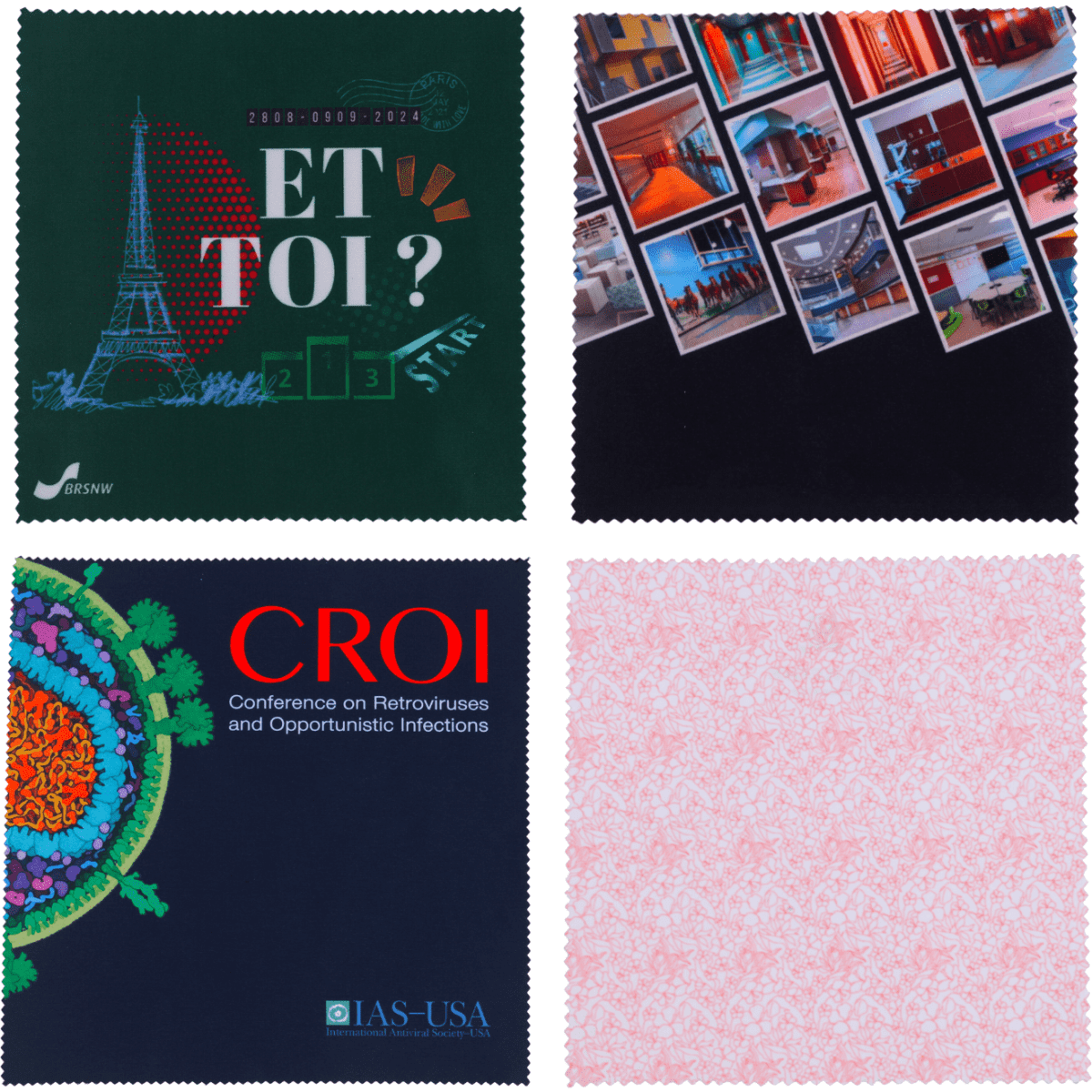 Four small microfibre cleaning cloths in various designs and colours, featuring images such as the Eiffel Tower and virus patterns. Each cloth has a distinct logo.
