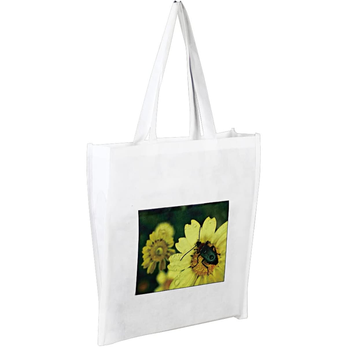 A white tote bag featuring a photograph of a beetle on a yellow flower. It has long handles for easy carrying.