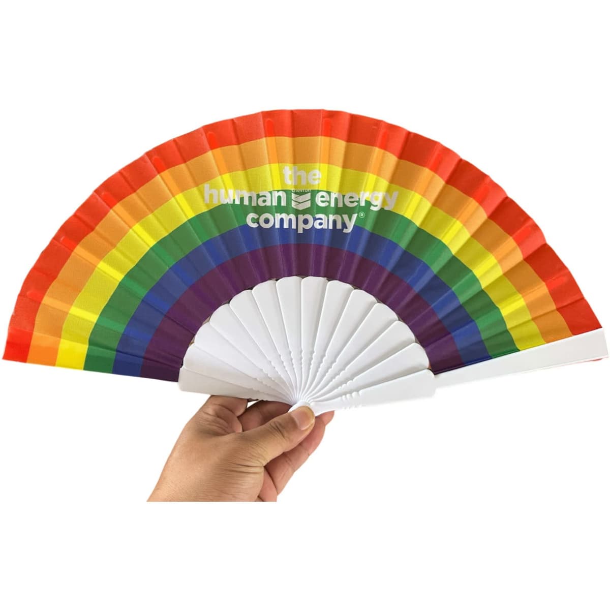 A folding hand fan featuring a rainbow design with white accents and a logo.