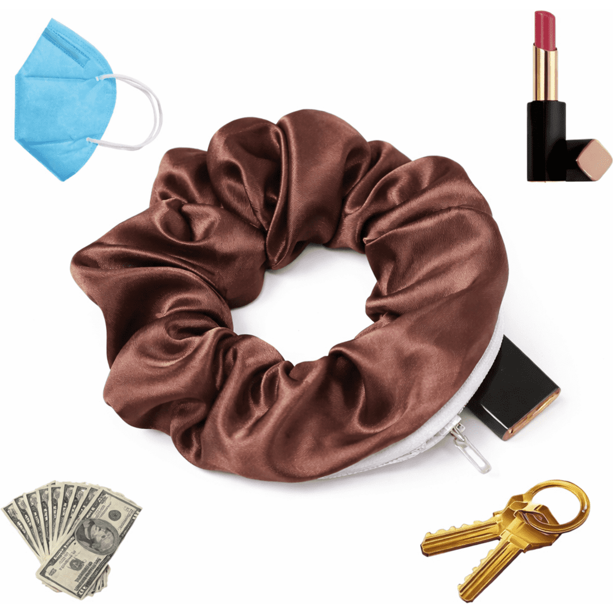 A brown satin scrunchie with a zipper, surrounded by a blue mask, lipstick, keys, and cash.