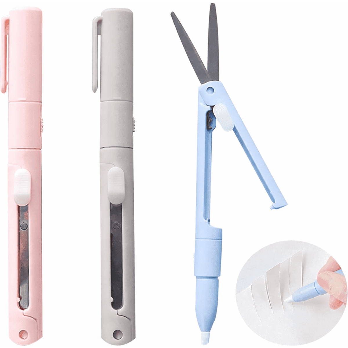 A set of three multi-functional tools in pink, grey, and blue, featuring scissors, a knife, and a pen.