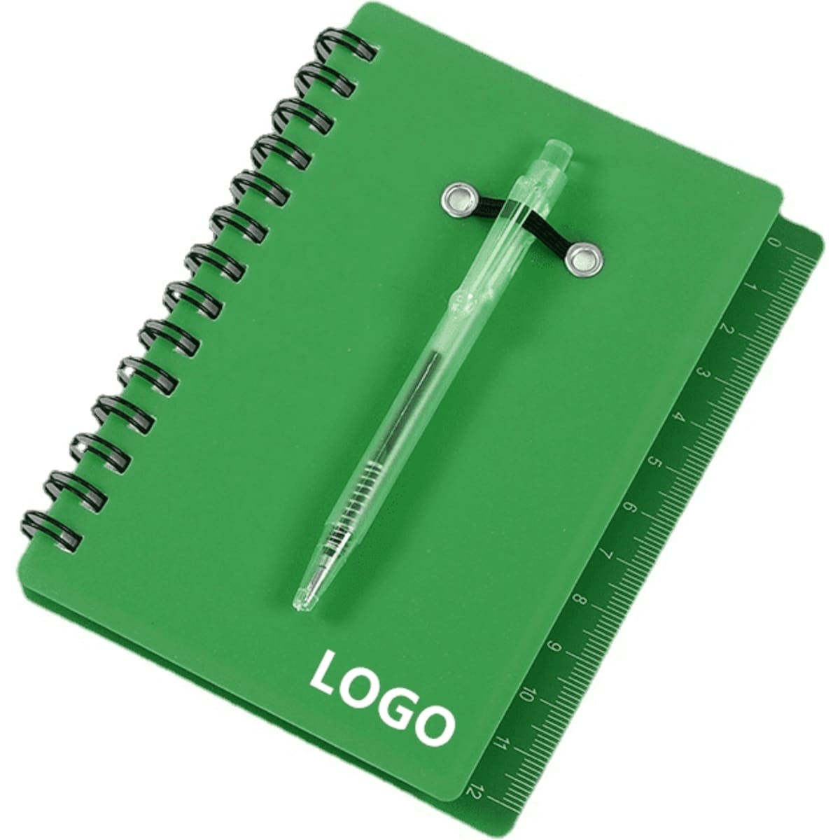 A green mini notebook with a spiral binding and a ballpoint pen attached, featuring a ruler along the edge.