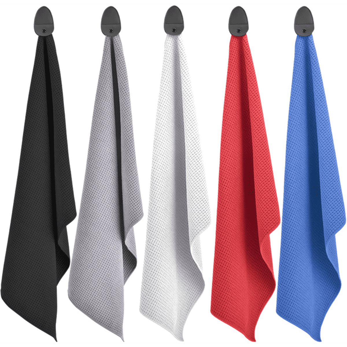 A set of five magnetic golf towels in black, grey, white, red, and blue, hanging from hooks. Each towel features a textured design.