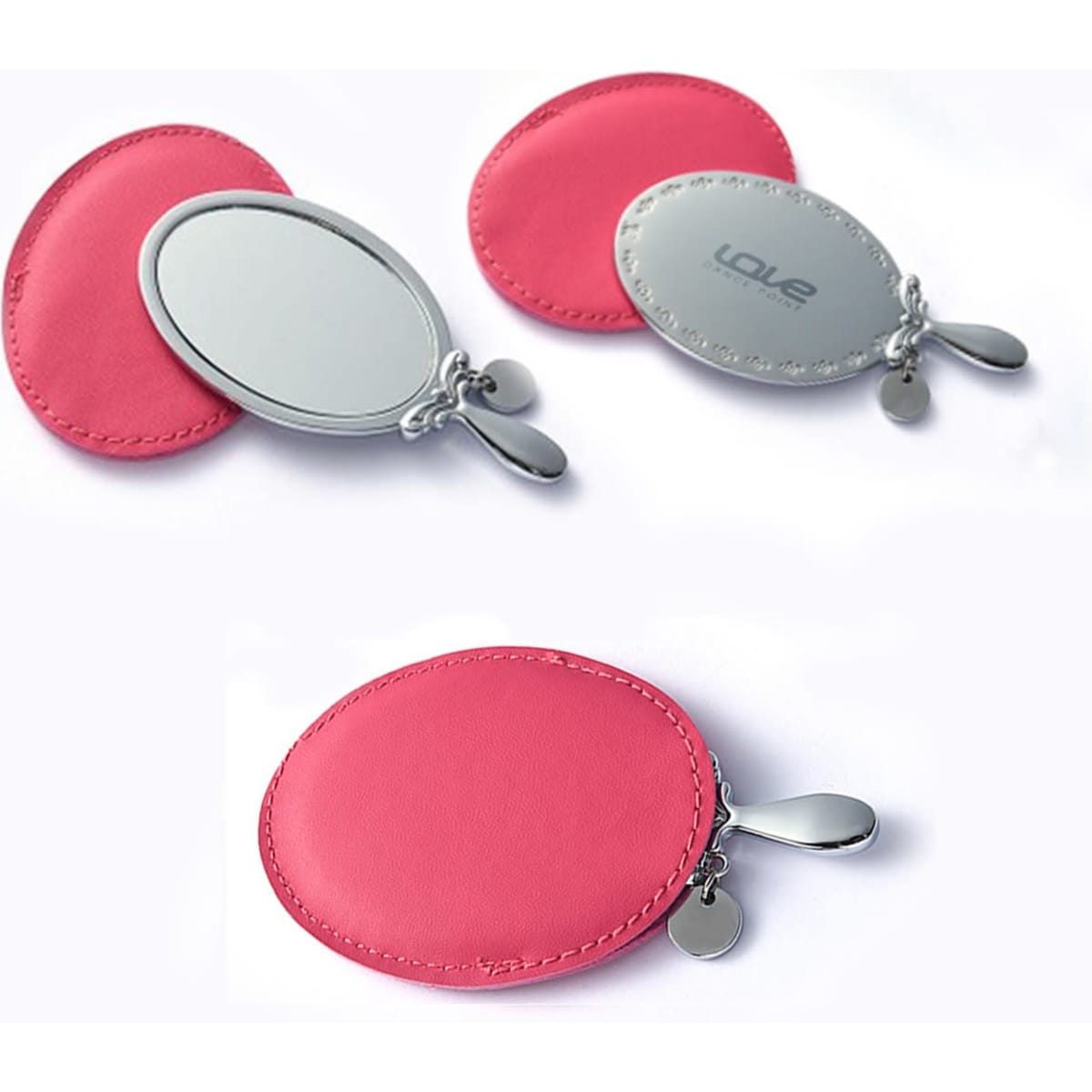 A pink mini cosmetic mirror with a sleek silver finish and a decorative pull tab. Includes a logo on the mirror.
