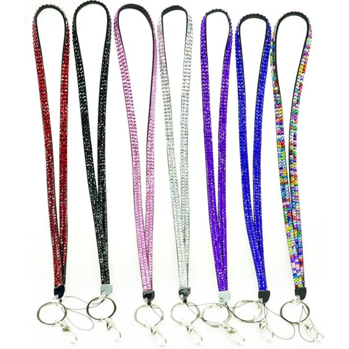 A collection of rhinestone glitter lanyards in red, black, pink, silver, purple, and a multi-coloured design. Each lanyard includes a keyring attachment.