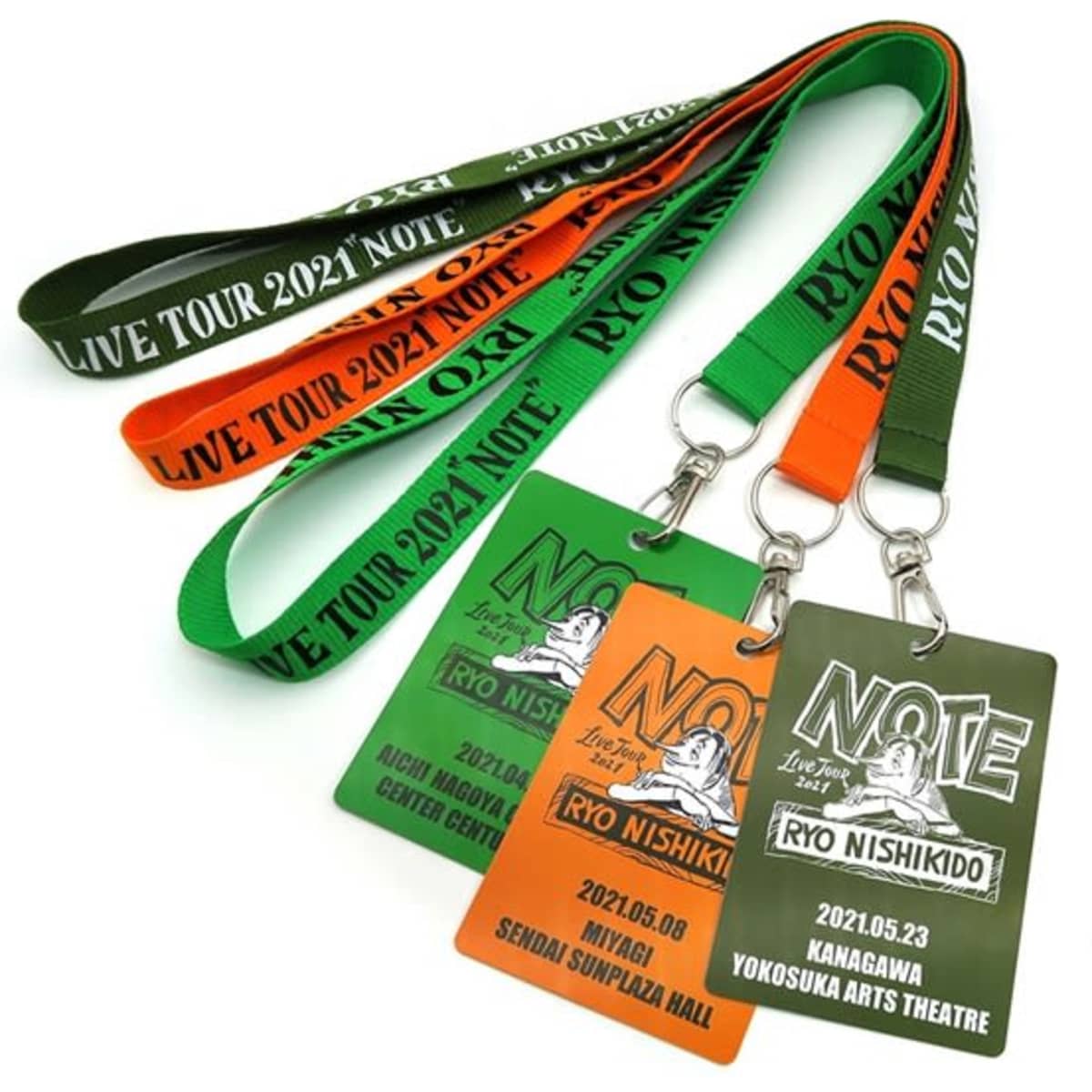 Lanyards in green, orange, and red with PVC cards attached, featuring a logo and event details.