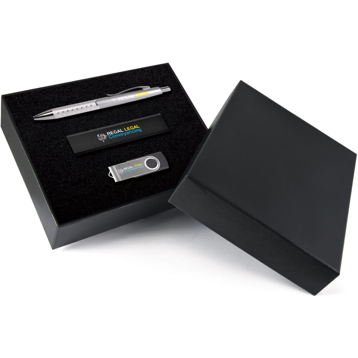 A black gift set containing a silver pen, a USB drive, and a black flash drive, presented in a sleek box.