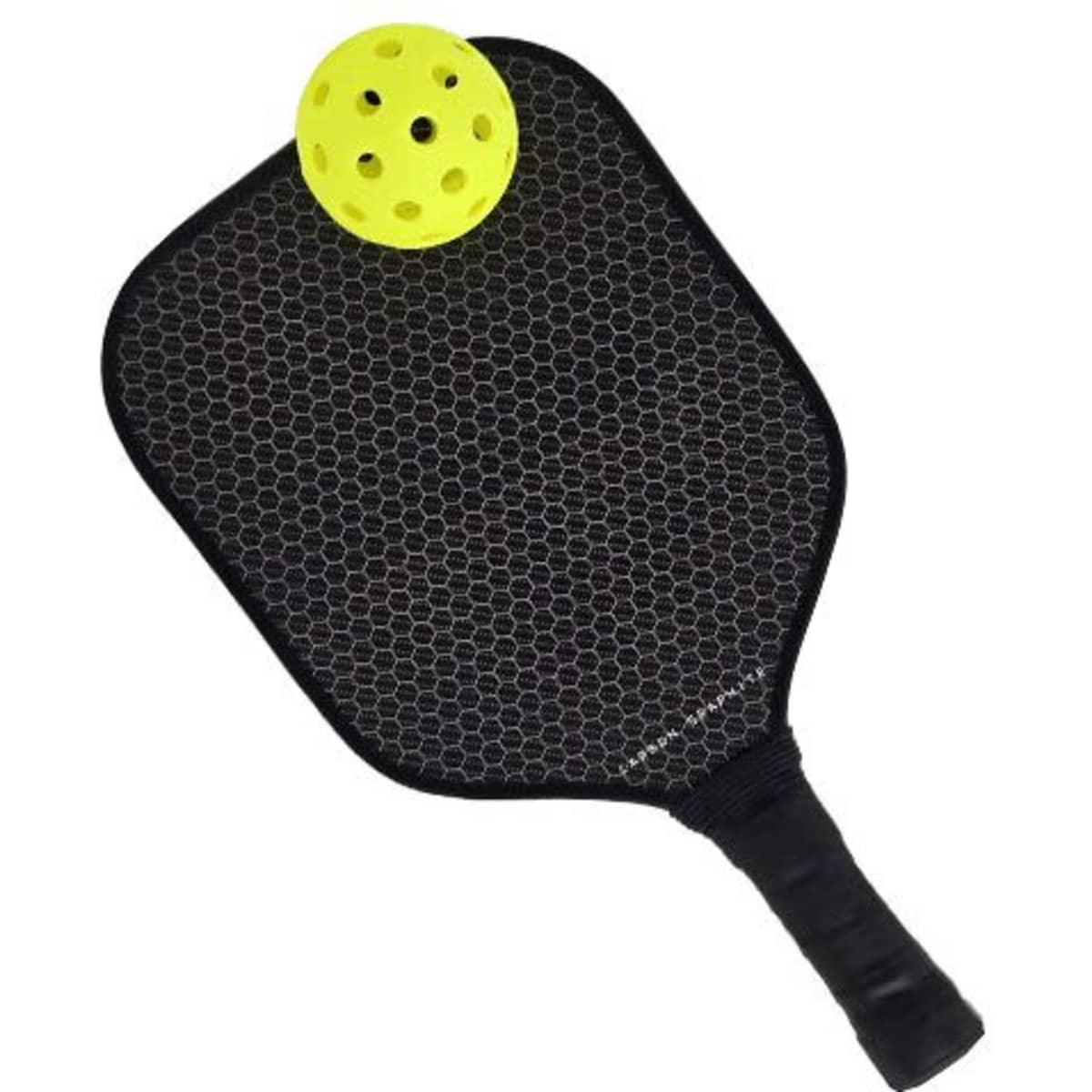 A pickleball paddle with a honeycomb design and a bright yellow ball resting on top. The handle is wrapped in black.