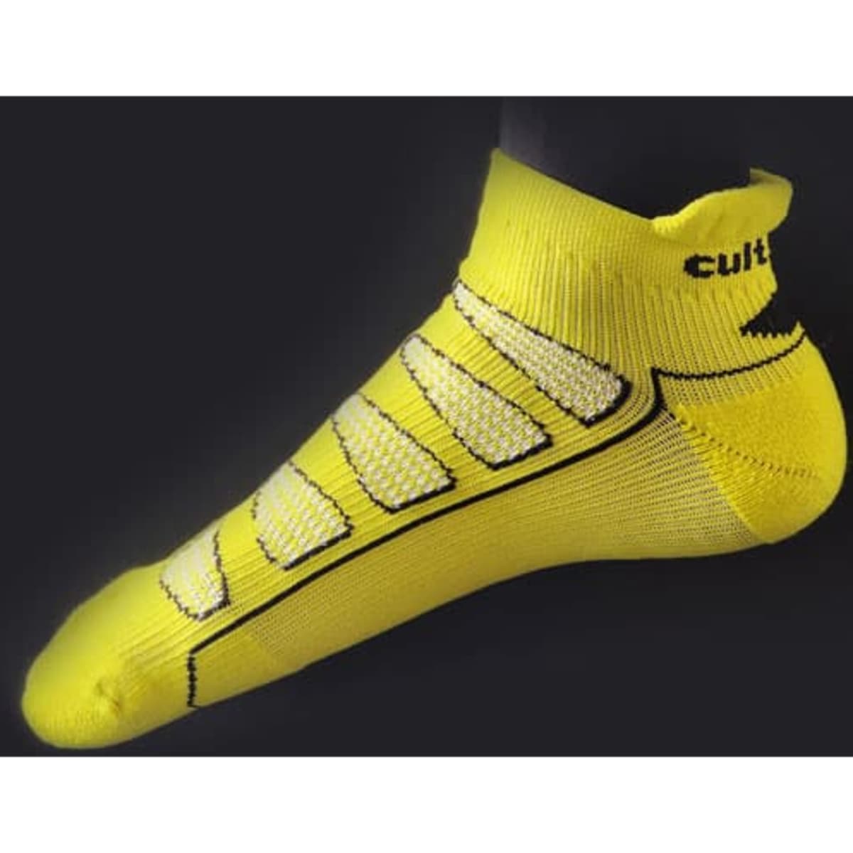 A pair of yellow athletic socks with compression features and a logo on the cuff.