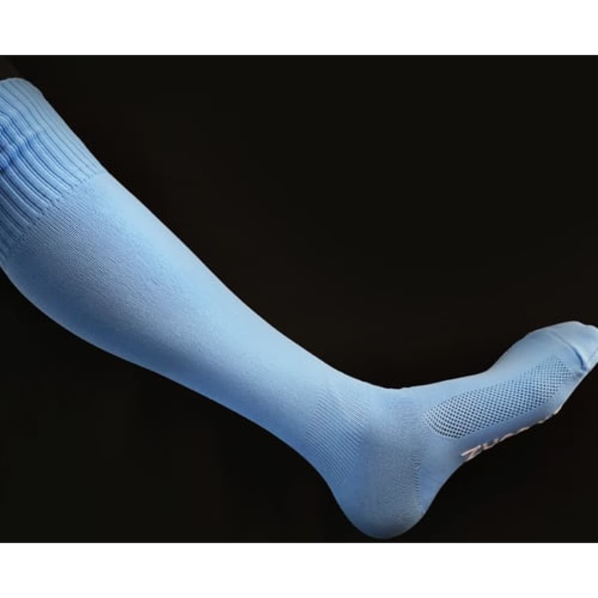 Sky blue football sock featuring a ribbed top and textured sole, with a logo on the side.