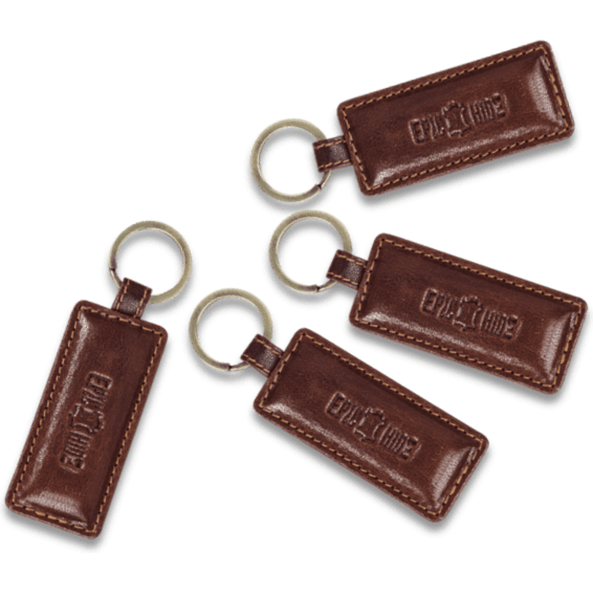 Brown leather keyrings featuring a circular keyring attachment, with embossed logos on each.