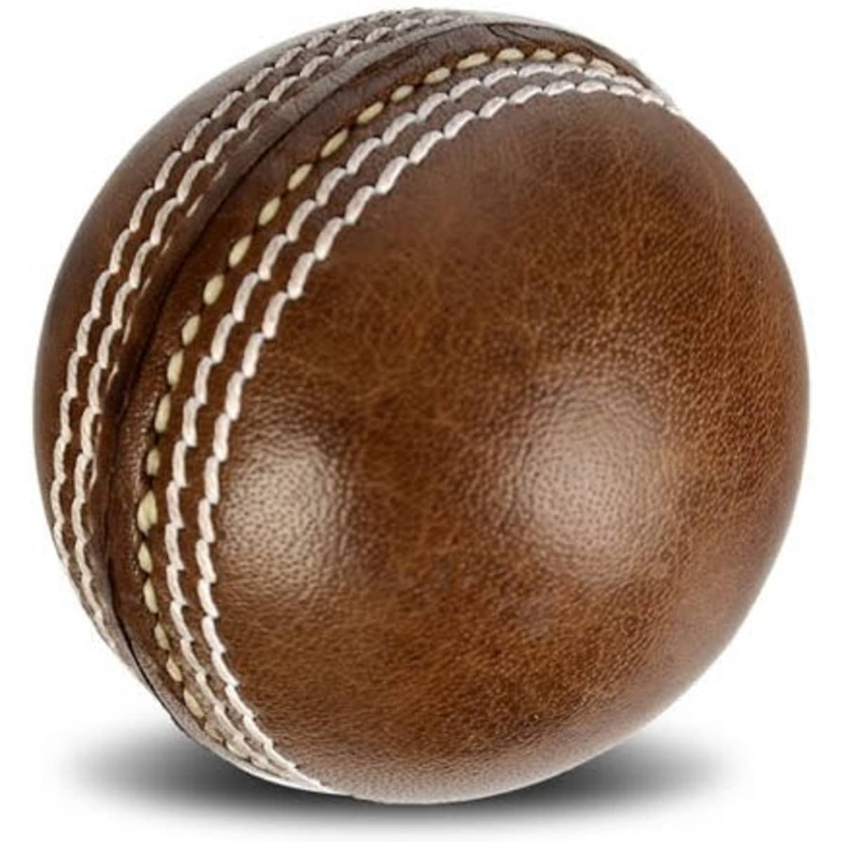 A brown vintage leather cricket ball with white stitching details, featuring a smooth, polished surface and a classic design.