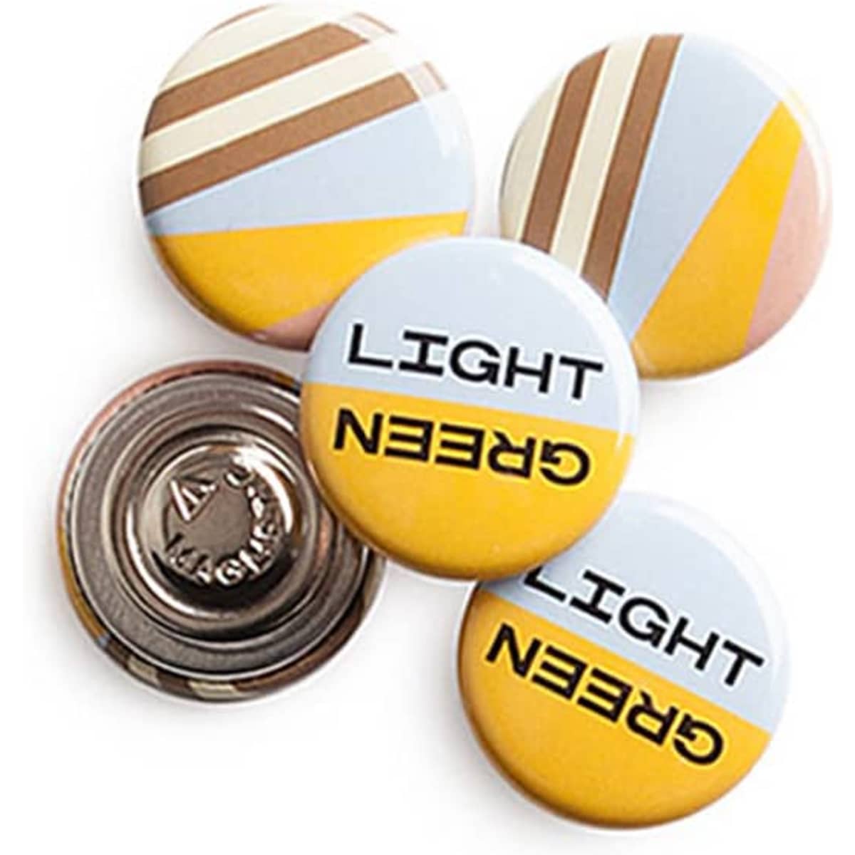 Four round magnet fasteners in light green, yellow, and patterns, featuring a backing with a logo.