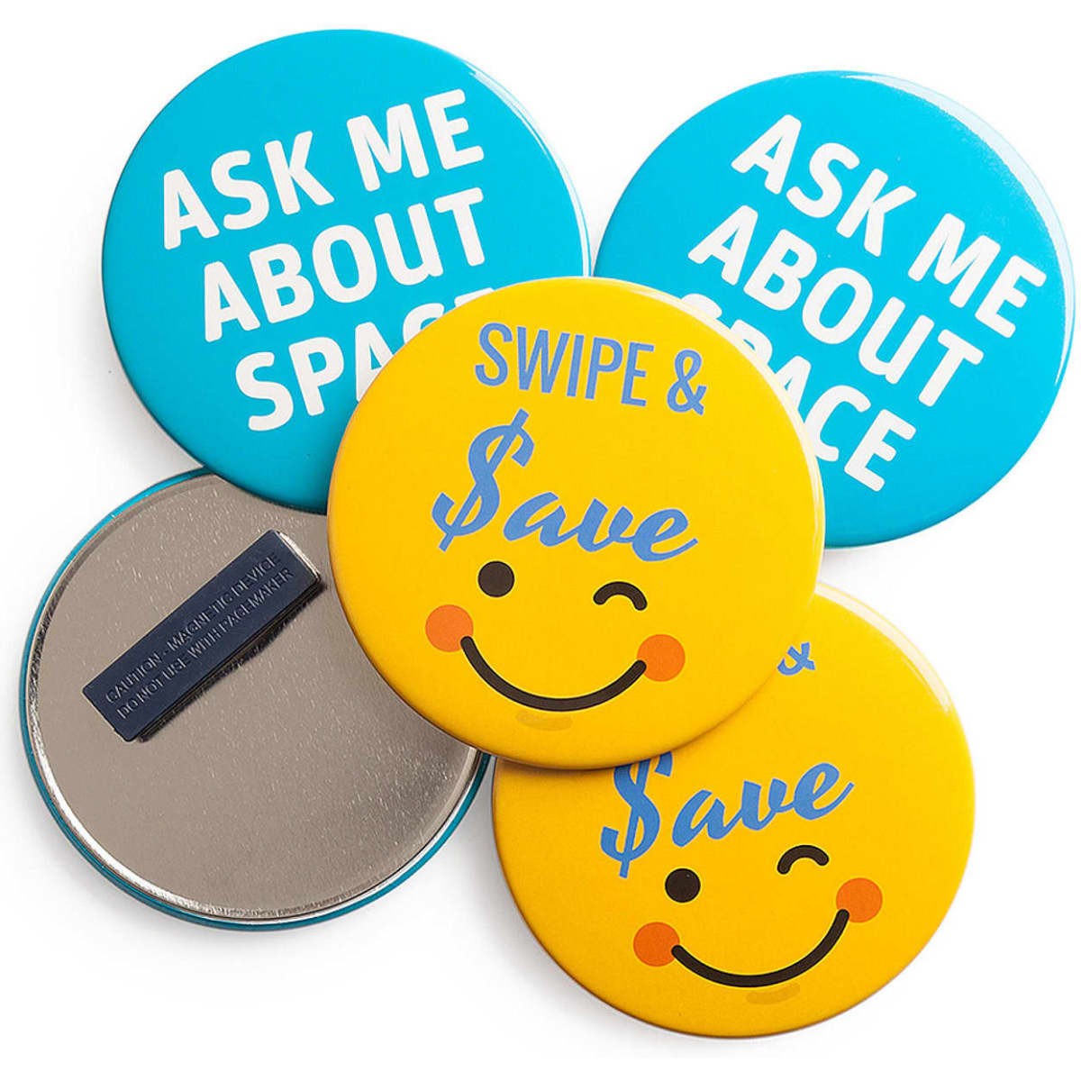 Four round badges in blue and yellow featuring various designs and a magnet fastener on the back.