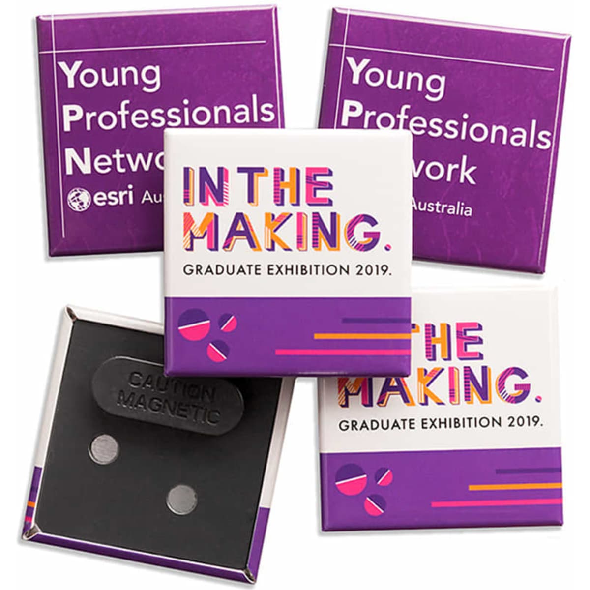 A square magnet fastener badge in purple and white, featuring various designs and a logo.