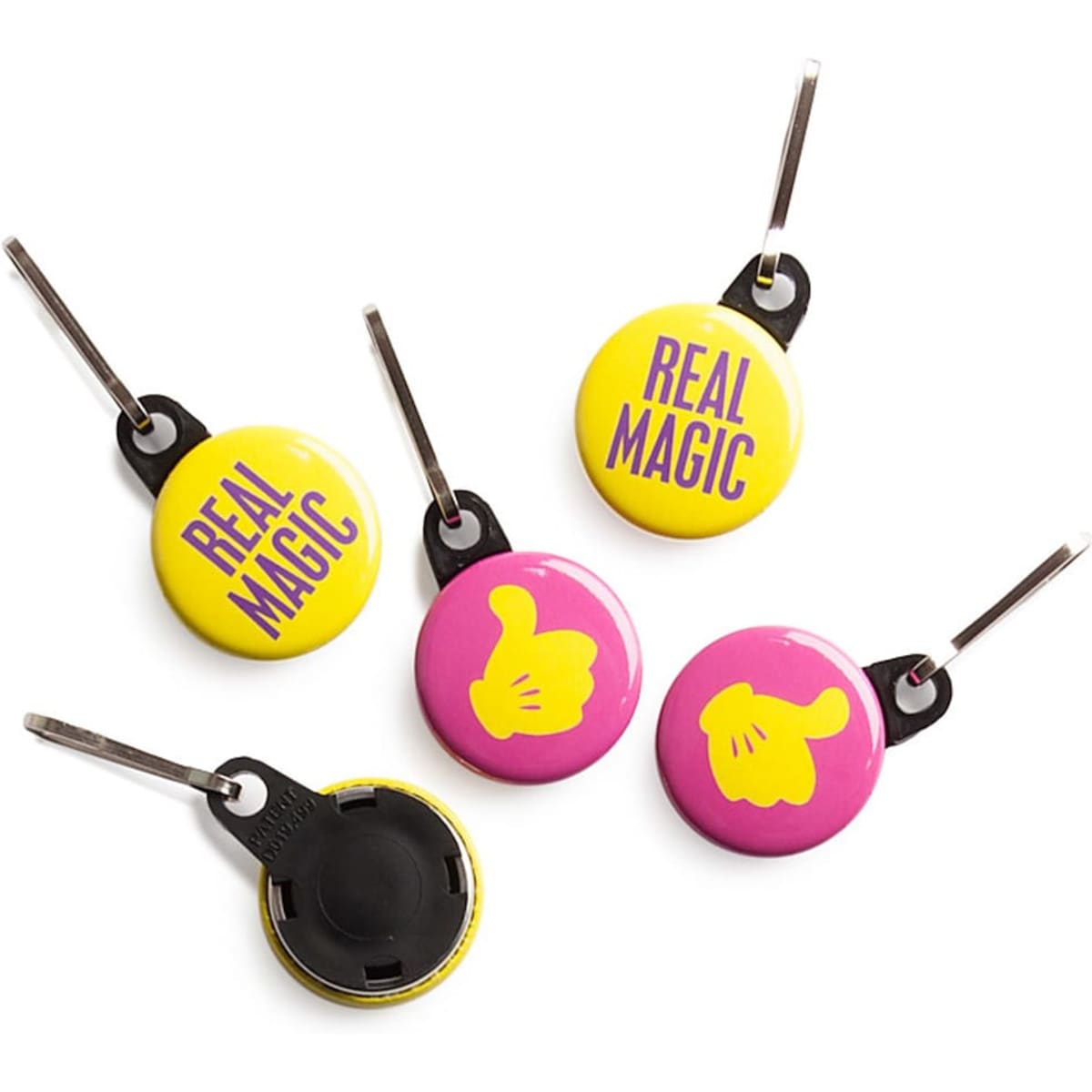 Five custom printed 25mm round zipper pulls in yellow and pink, featuring various designs and a black attachment.