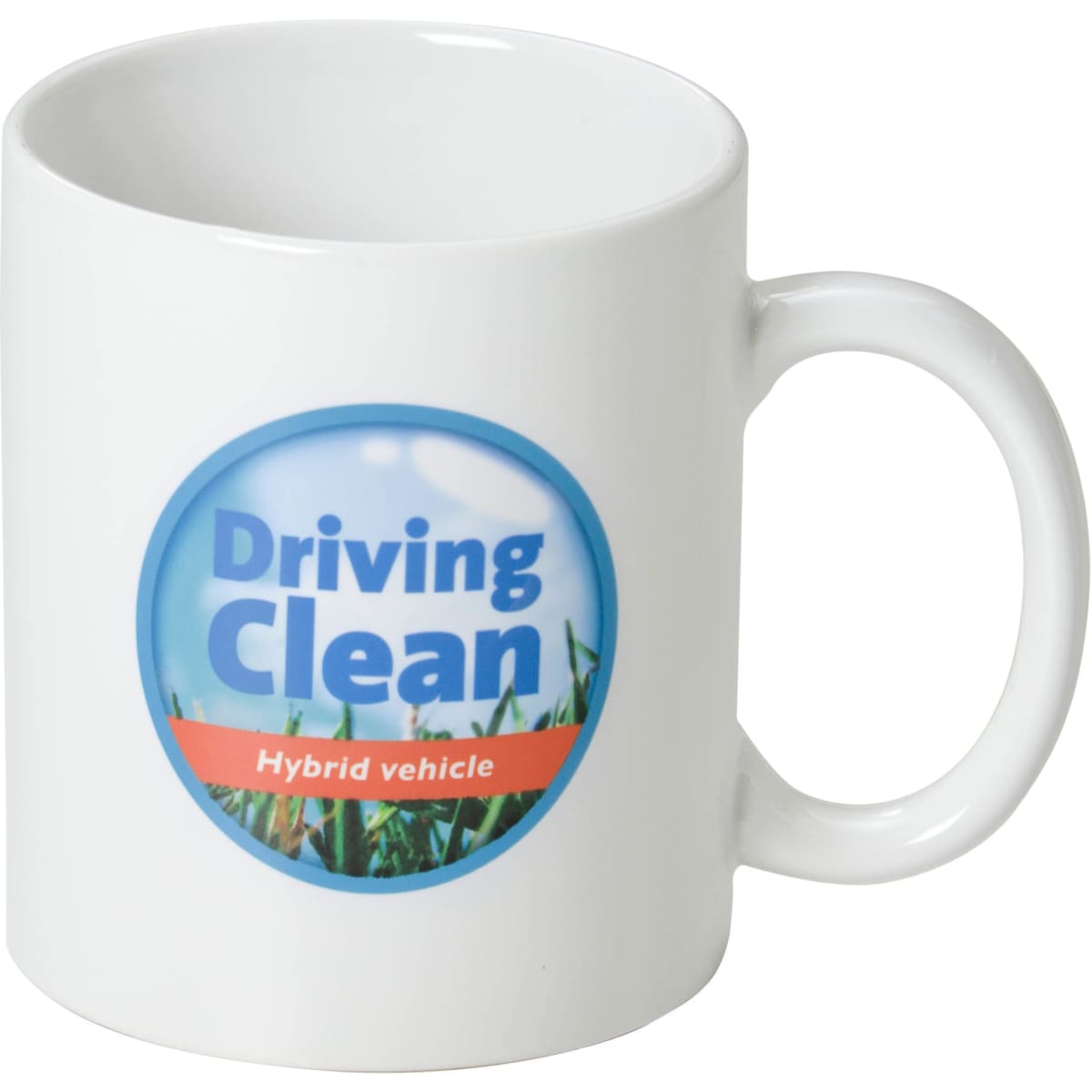 A white coffee mug with a circular logo featuring blue and orange elements, set against a grassy background.