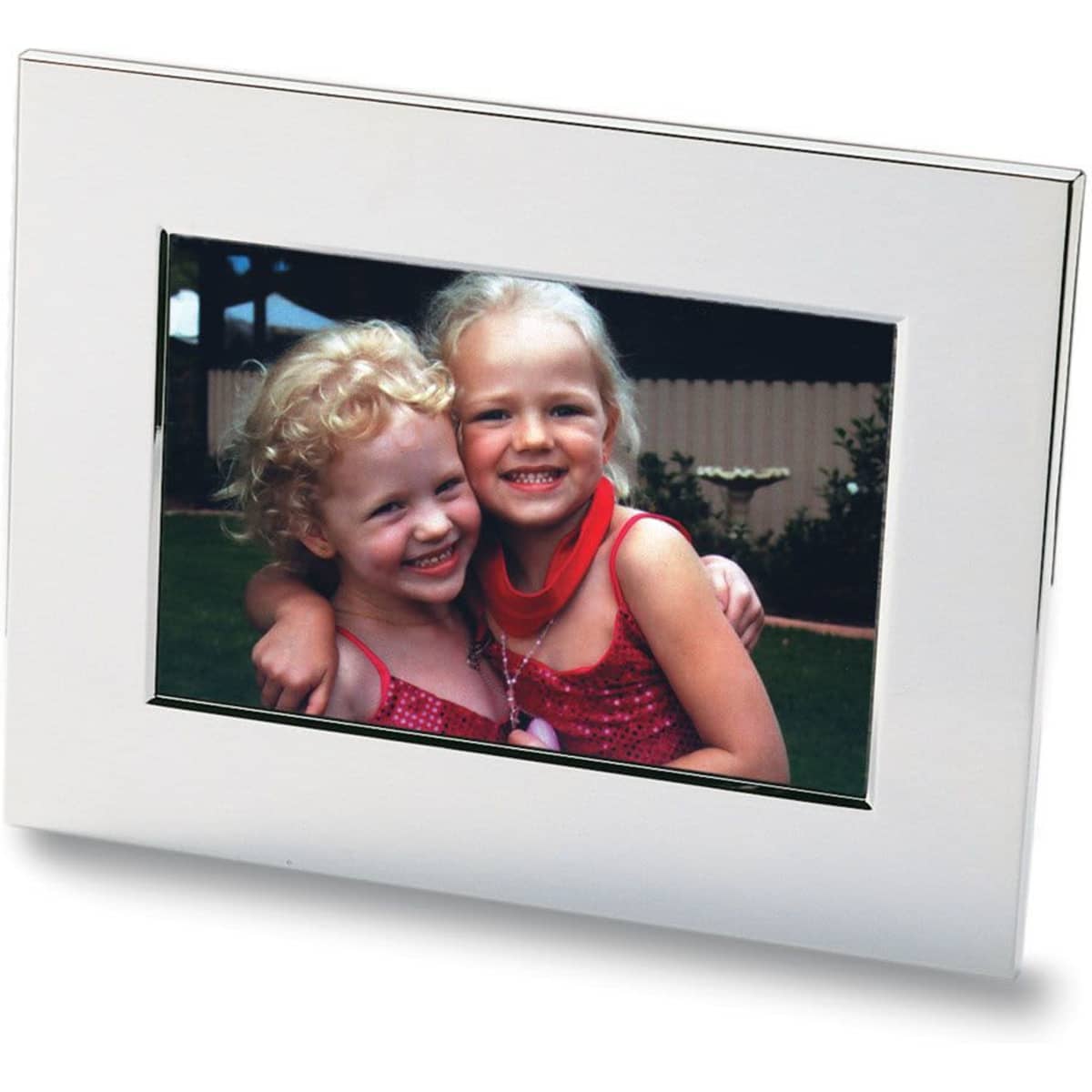 A nickel-plated photo frame featuring a vibrant image of two smiling girls with curly hair.