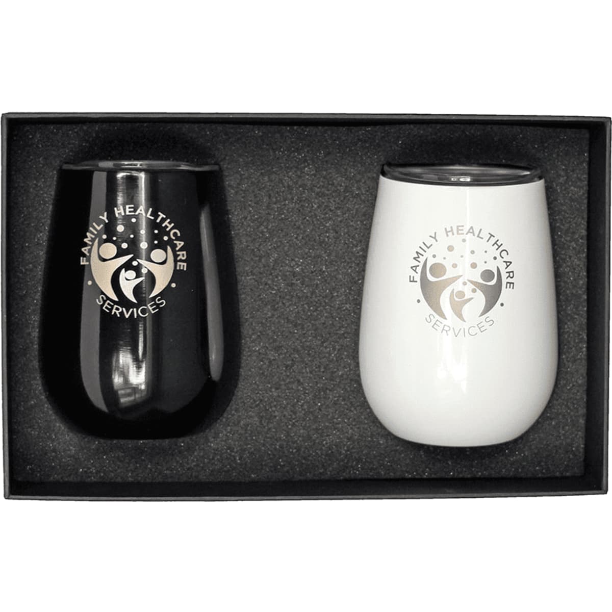 A drink set featuring two insulated tumblers, one black and one white, in a gift box with a logo.