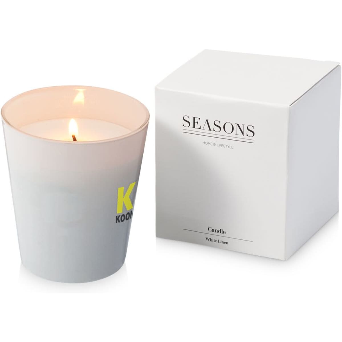 A grey scented candle in a frosted glass holder, accompanied by a white box. The candle is burning, revealing a soft glow.
