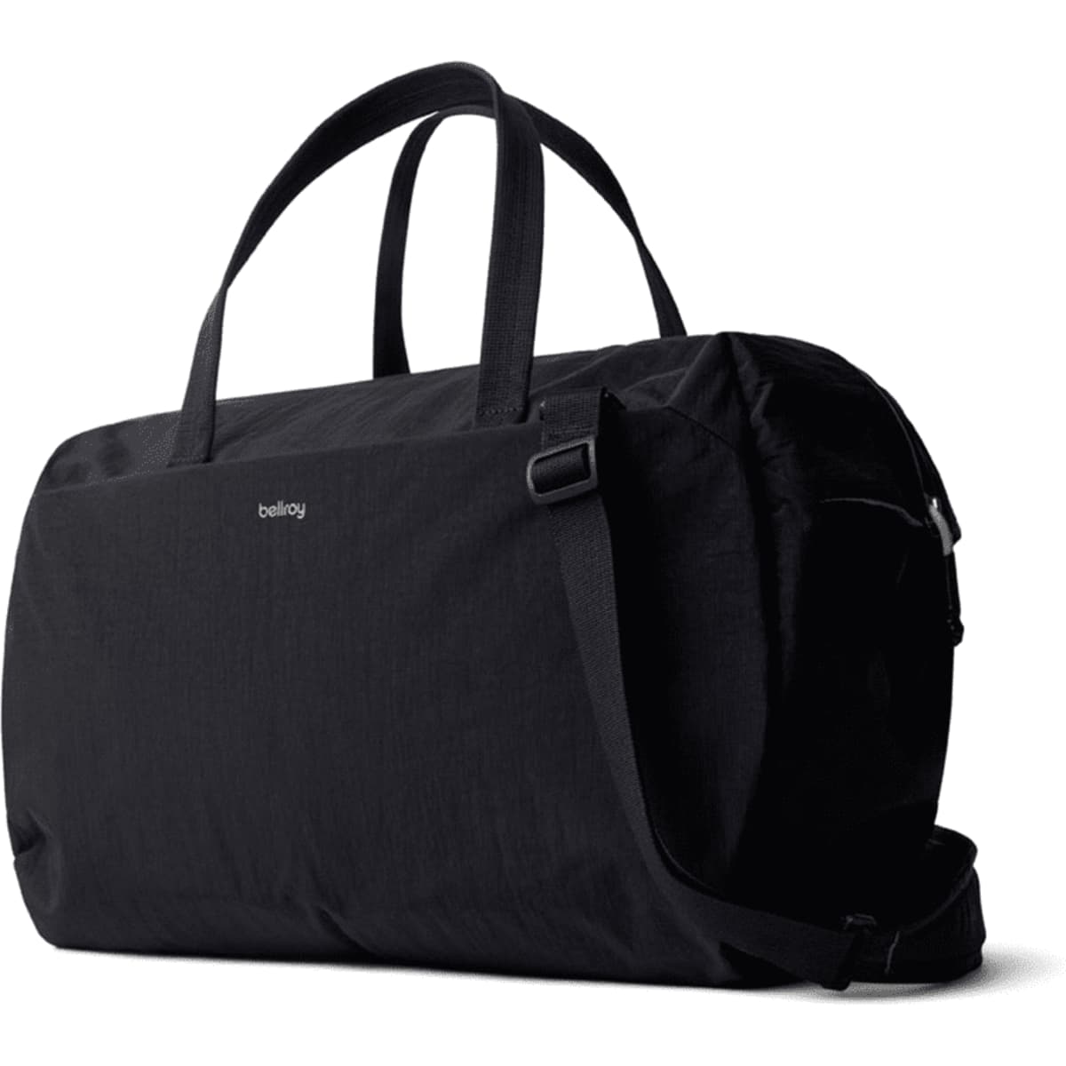 A black duffel bag with two handles and a shoulder strap, featuring a logo.