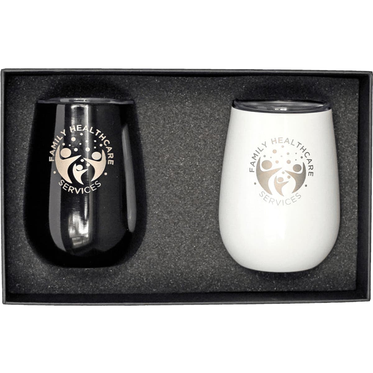 A drink cup giftset featuring a black and a white insulated cup, both with branding, in a gift box.