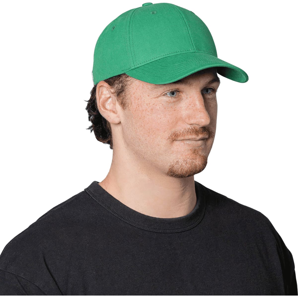 A green cap made of organic cotton twill, featuring a curved brim and an adjustable strap at the back.