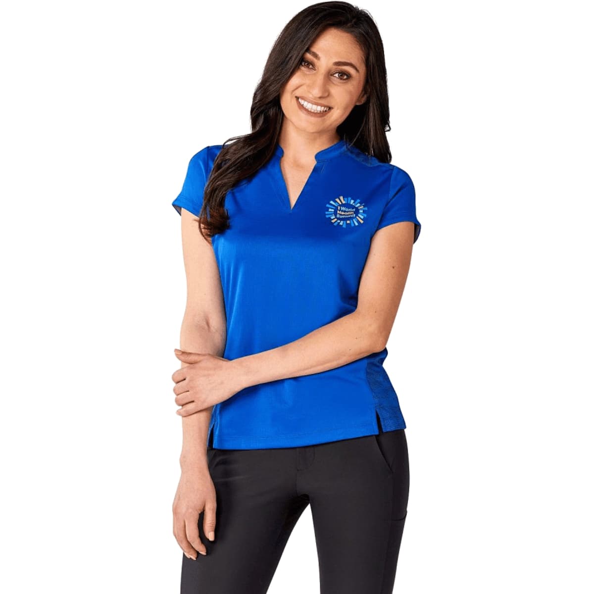 A woman is wearing a vibrant blue short sleeve performance polo shirt with a logo on the chest.