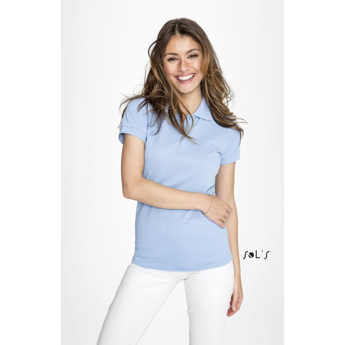 A light blue women's polo shirt made from 65% polyester and 35% ring spun cotton, featuring a logo.