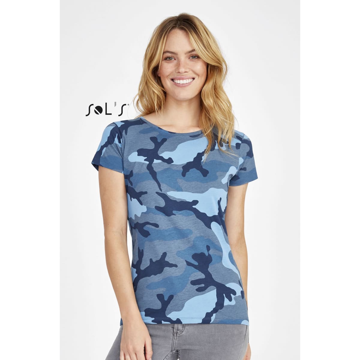A blue camo women's T-shirt with a round collar, featuring a logo. The design includes various shades of blue.