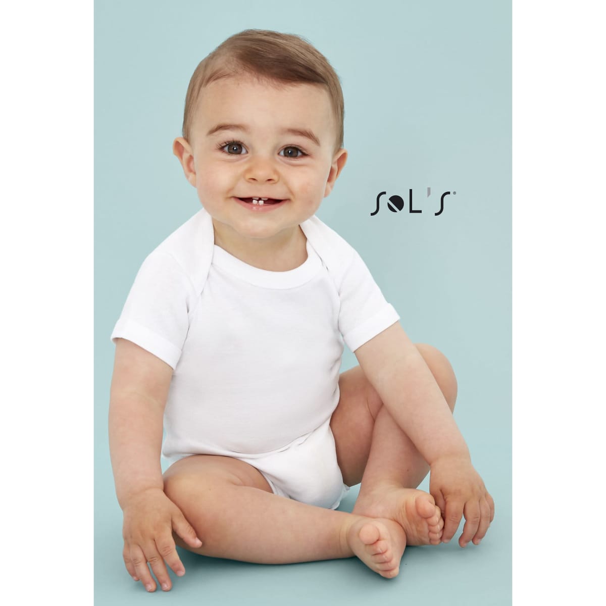 A white baby bodysuit made from 100% organic cotton, worn by an infant sitting on a light blue background.