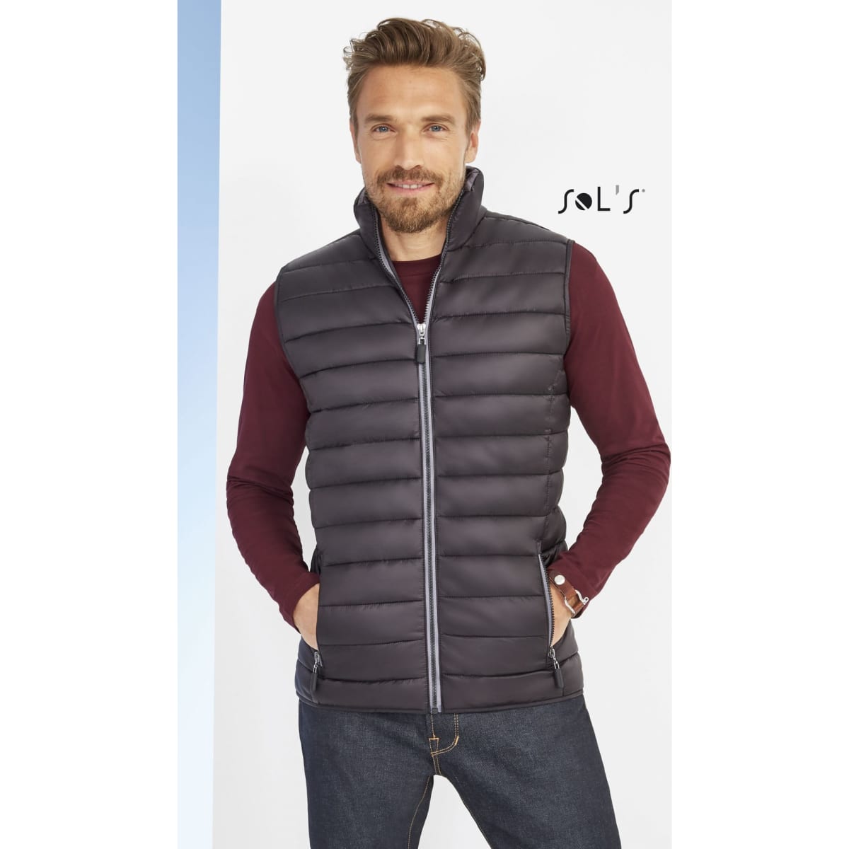 A men's puffer vest in black with a contrasting neck, featuring a zip front and a logo.