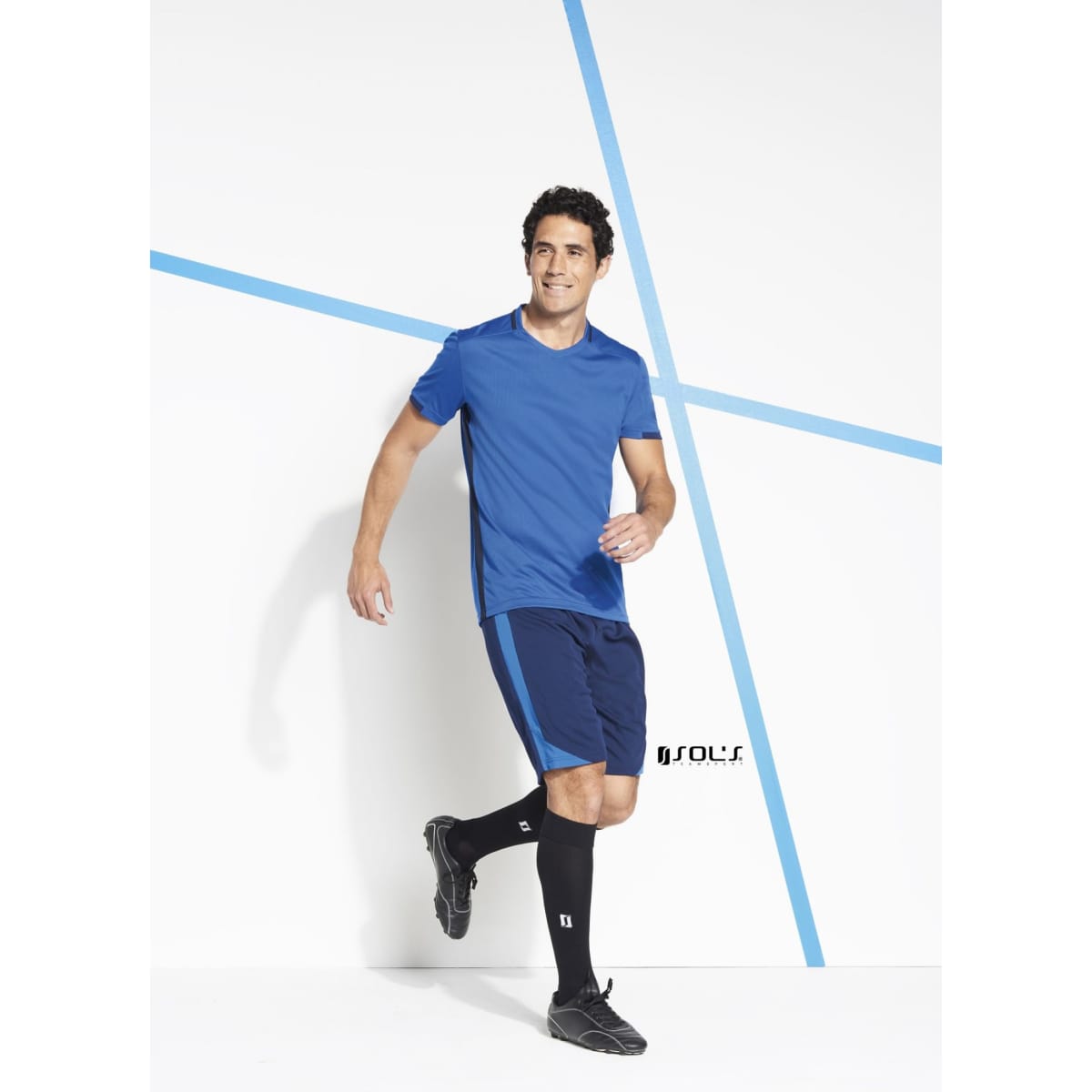 A blue V-neck T-shirt made of 100% breathable polyester, paired with dark shorts and knee-length socks.