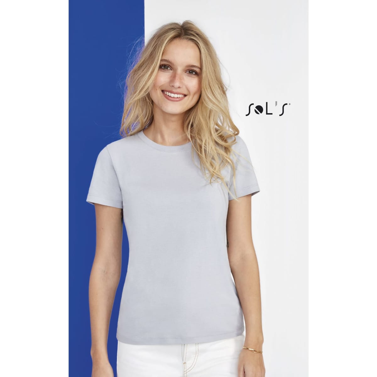A light grey women's T-shirt made of 100% semi-combed ring-spun cotton, featuring a logo.