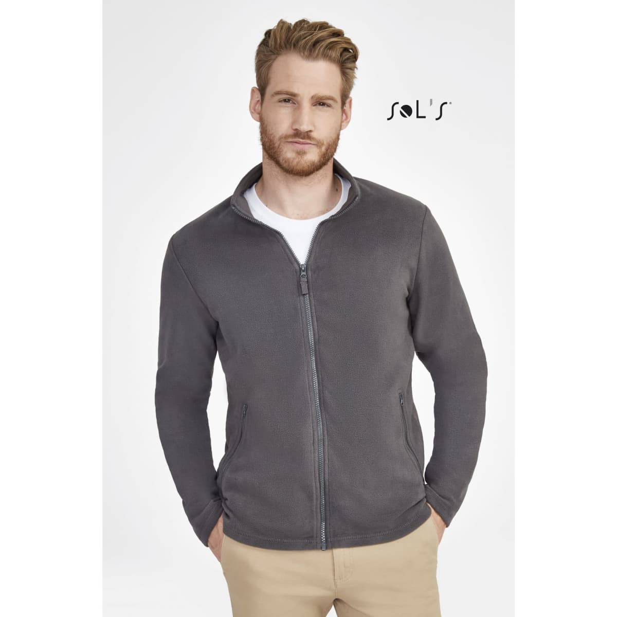 A grey fleece top for men featuring a zip-up front and two zip pockets, with a subtle logo.