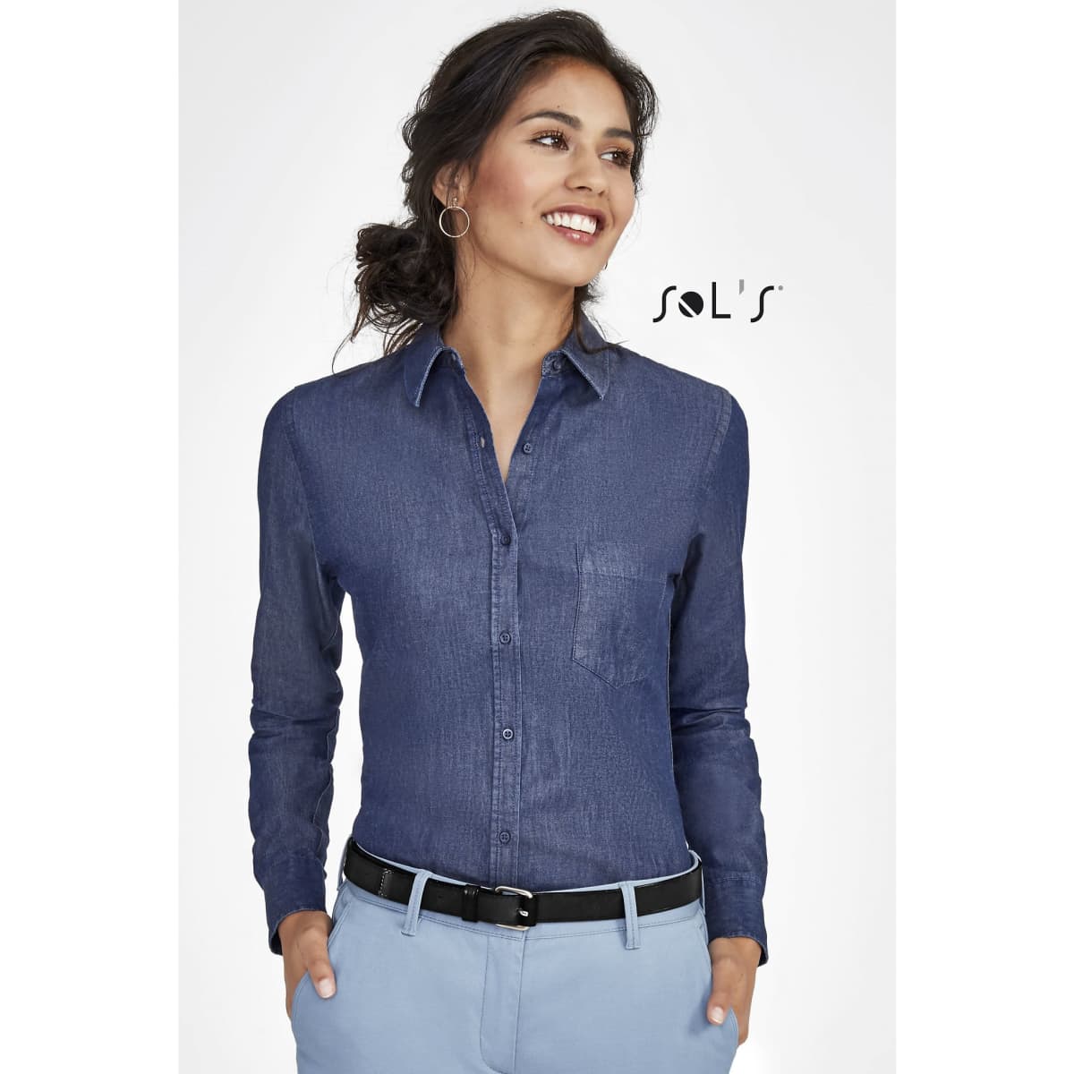 A women's long sleeve denim shirt in a dark blue shade, featuring a collared neck and a simple design.