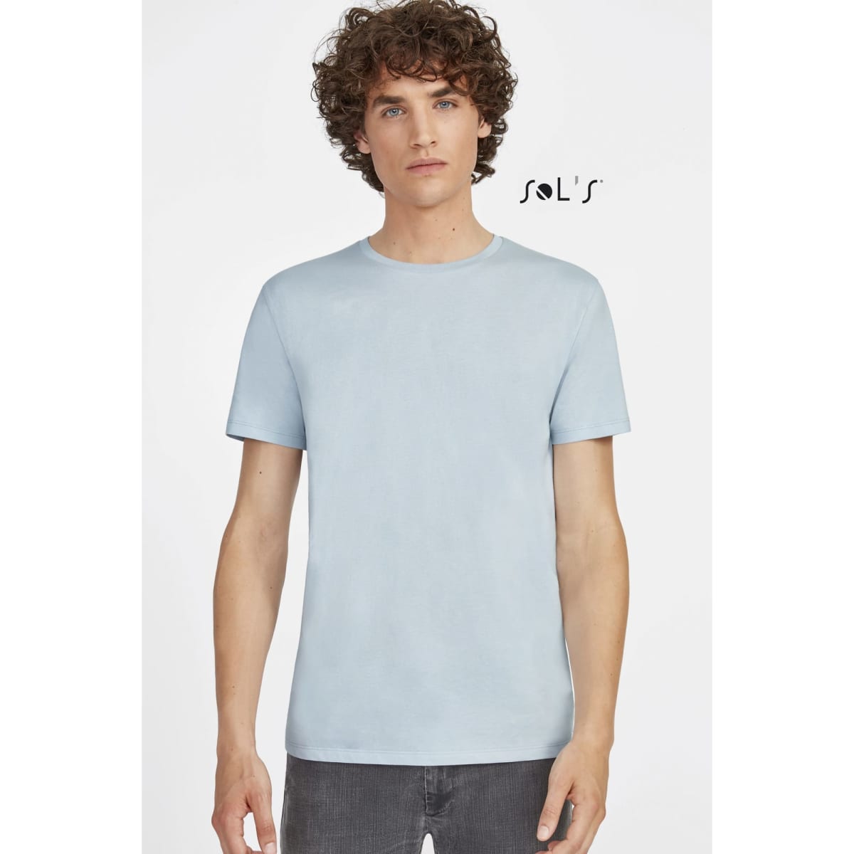 A men's round neck T-shirt in light blue, made from 100% semi combed ring spun cotton, featuring a logo.