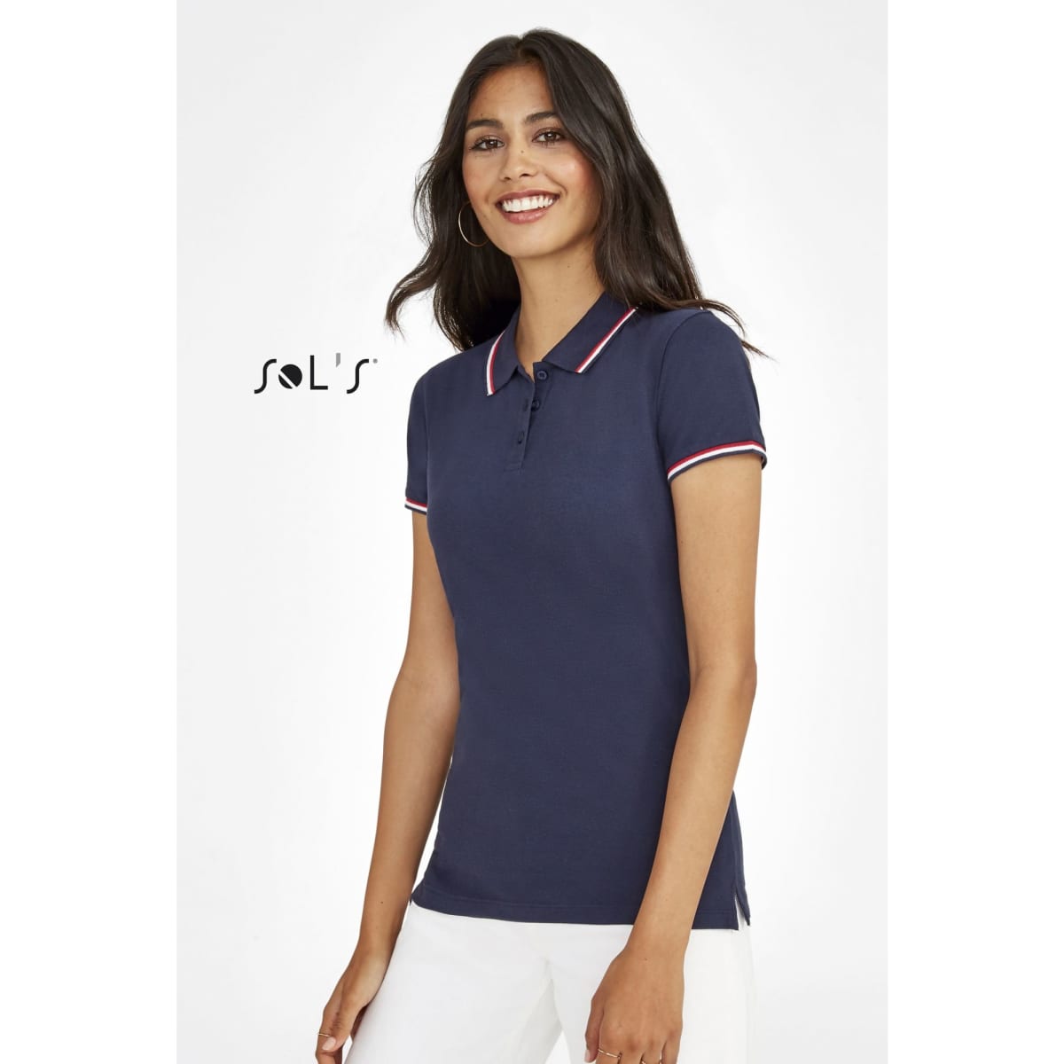 A women's navy polo shirt made of 100% cotton, featuring contrasting collar stripes and a logo.